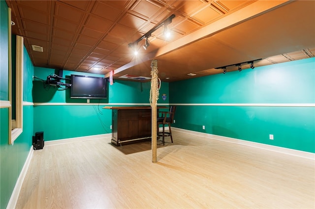 20 Parr Cir, Irondequoit, NY 14617 - indoor dry bar with track lighting and wood finished floors