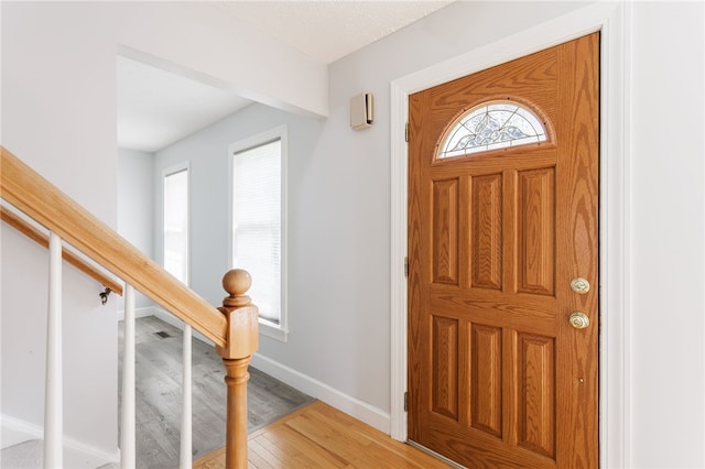 20 Parr Cir, Irondequoit, NY 14617 - entryway with light wood-style flooring and baseboards