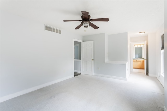 20 Parr Cir, Irondequoit, NY 14617 - unfurnished bedroom with light carpet, ensuite bath, and ceiling fan
