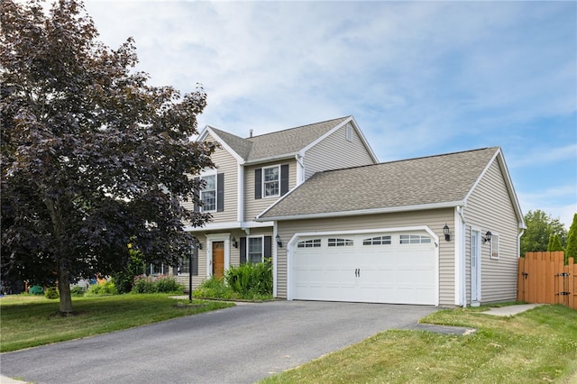 20 Parr Cir, Irondequoit, NY 14617 - view of front of home with an attached garage, a shingled roof, and asphalt driveway