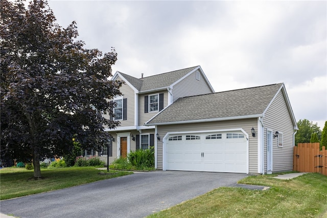 20 Parr Cir, Irondequoit, NY 14617 - colonial inspired home featuring an attached garage, driveway, and roof with shingles