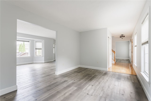 20 Parr Cir, Irondequoit, NY 14617 - unfurnished room with wood finished floors and stairs