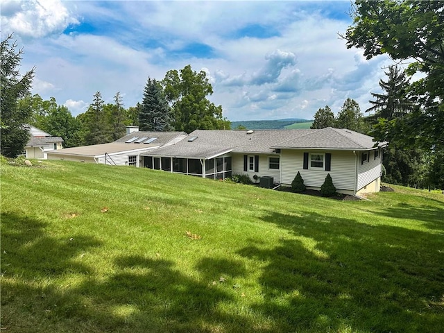 3265 Reading Rd, Reading, NY 14891 - rear view of property with a yard and a sunroom