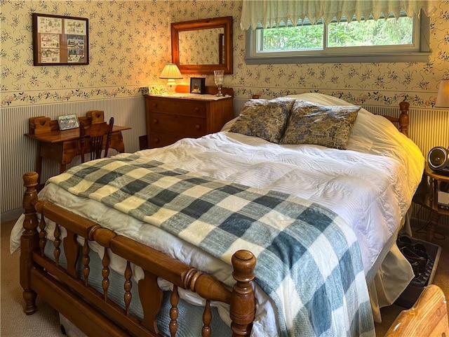 3265 Reading Rd, Reading, NY 14891 - bedroom with wallpapered walls, wainscoting, and multiple windows
