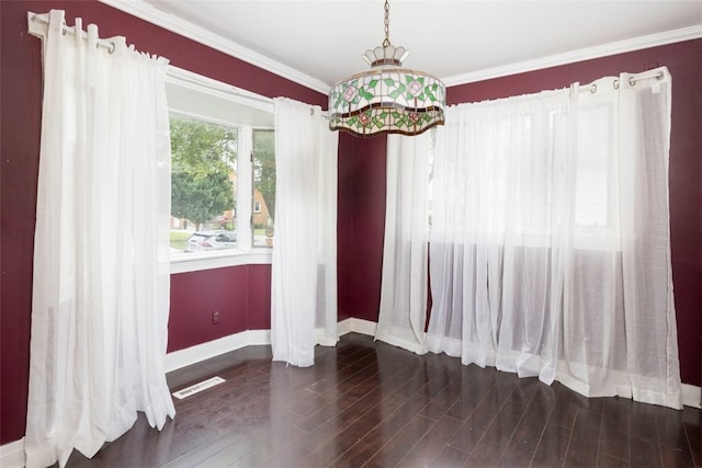 269 Michael Ave, Cheektowaga, NY 14212 - unfurnished dining area featuring wood finished floors and ornamental molding