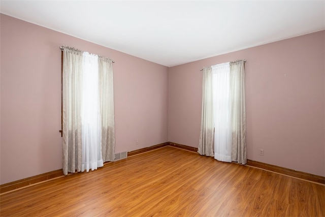 269 Michael Ave, Cheektowaga, NY 14212 - unfurnished room with light wood-style floors and baseboards