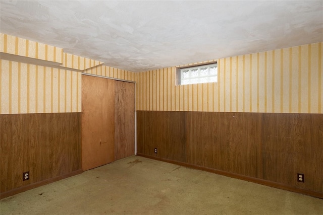 269 Michael Ave, Cheektowaga, NY 14212 - below grade area with wallpapered walls, wooden walls, wainscoting, and carpet floors