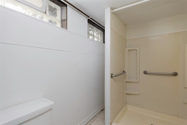 269 Michael Ave, Cheektowaga, NY 14212 - bathroom featuring a shower and tile patterned flooring
