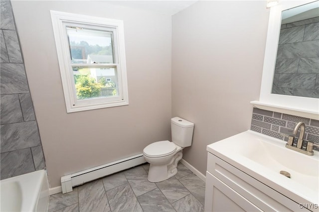 209 Pear Tree Dr, Camillus, NY 13031 - bathroom featuring baseboard heating, marble look tile flooring, vanity, a tub, and decorative backsplash