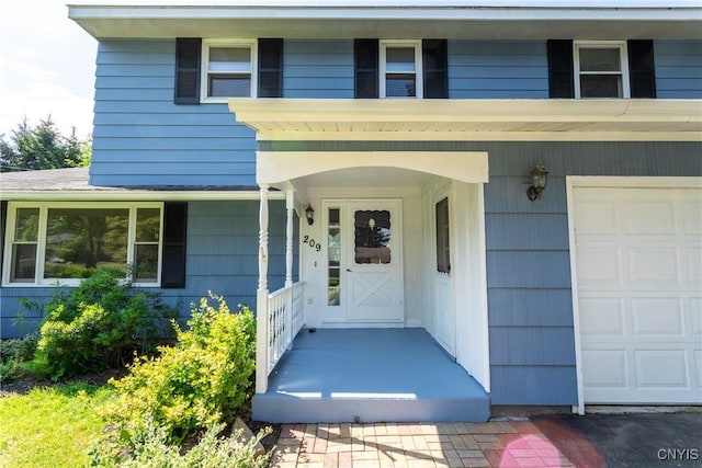 209 Pear Tree Dr, Camillus, NY 13031 - doorway to property with covered porch