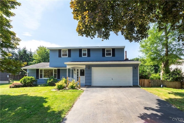 209 Pear Tree Dr, Camillus, NY 13031 - traditional-style house with an attached garage, driveway, and covered porch