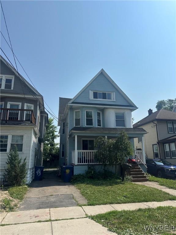 91 Lockwood Ave, Buffalo, NY 14220 - traditional style home featuring a porch and concrete driveway