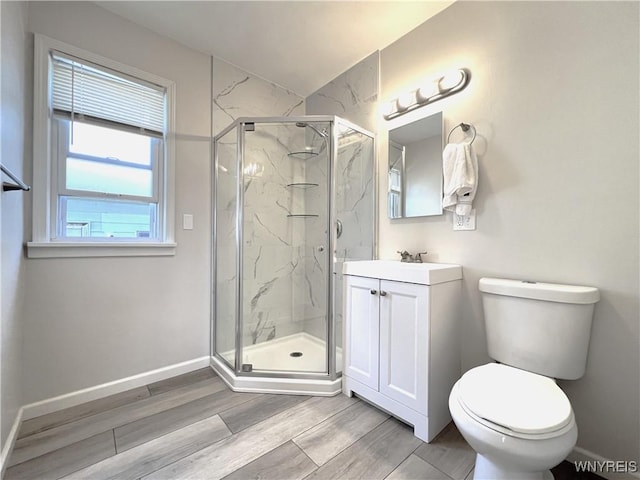 42 Argus St, Buffalo, NY 14207 - bathroom featuring vanity, a marble finish shower, and wood finished floors
