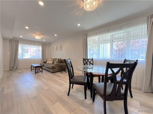 42 Argus St, Buffalo, NY 14207 - dining room featuring light wood-type flooring, recessed lighting, and a chandelier