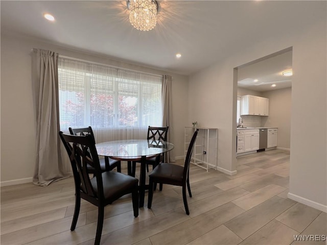 42 Argus St, Buffalo, NY 14207 - dining area featuring light wood-type flooring, a chandelier, and recessed lighting