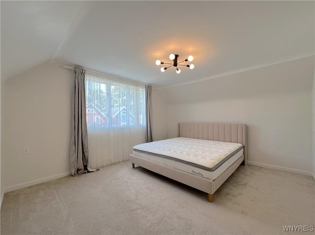 42 Argus St, Buffalo, NY 14207 - bedroom featuring a chandelier, lofted ceiling, and light carpet