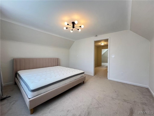 42 Argus St, Buffalo, NY 14207 - bedroom with a chandelier, vaulted ceiling, and light colored carpet