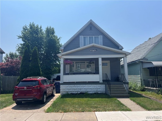 42 Argus St, Buffalo, NY 14207 - view of front facade with a porch
