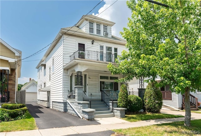 46 Alexander Ave, Cheektowaga, NY 14211 - traditional style home with a balcony, an outdoor structure, a porch, and a detached garage