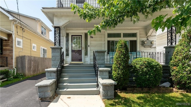 46 Alexander Ave, Cheektowaga, NY 14211 - entrance to property featuring a porch and stone siding