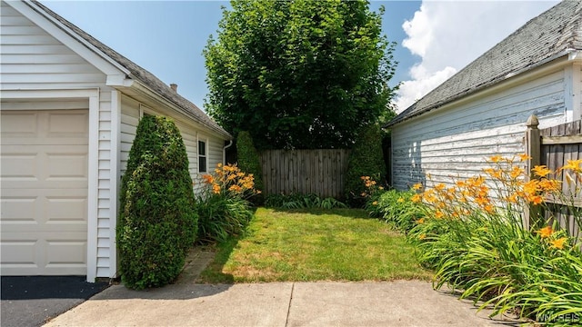 46 Alexander Ave, Cheektowaga, NY 14211 - view of yard featuring a garage