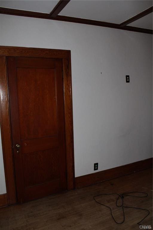 unfurnished room with dark hardwood / wood-style floors