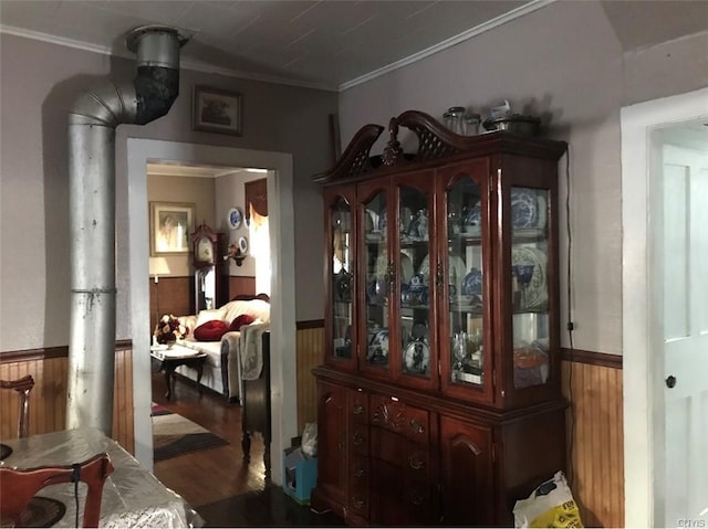 interior space with crown molding and dark hardwood / wood-style floors