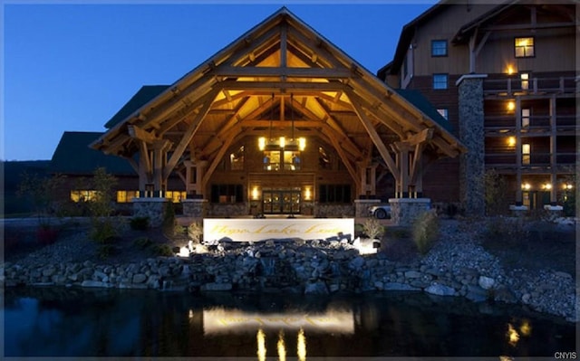 exterior space featuring a gazebo, a pool, and a patio