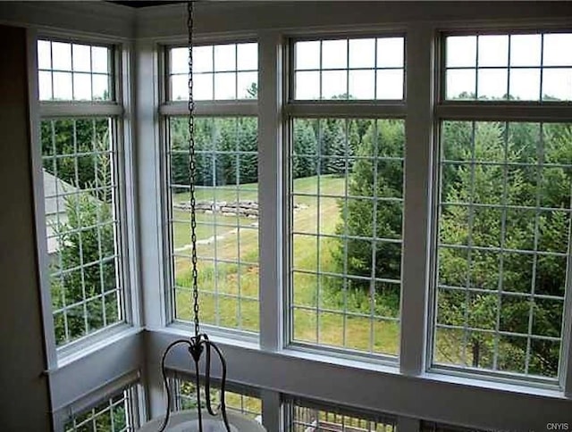 doorway to outside featuring a healthy amount of sunlight