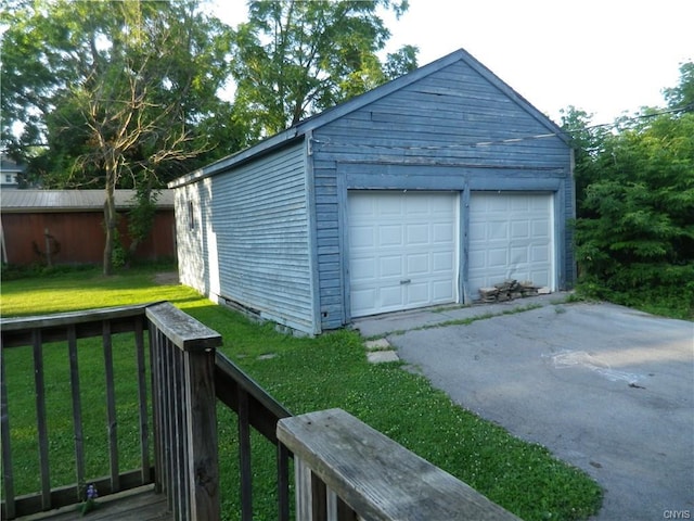 garage with a lawn