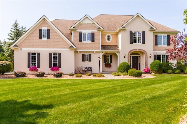 view of front of home with a front yard