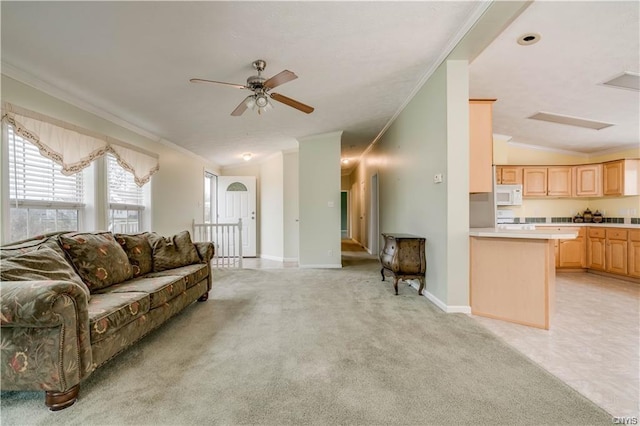 tiled living room with vaulted ceiling, ornamental molding, and ceiling fan