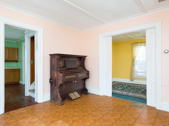 miscellaneous room with crown molding and light parquet flooring