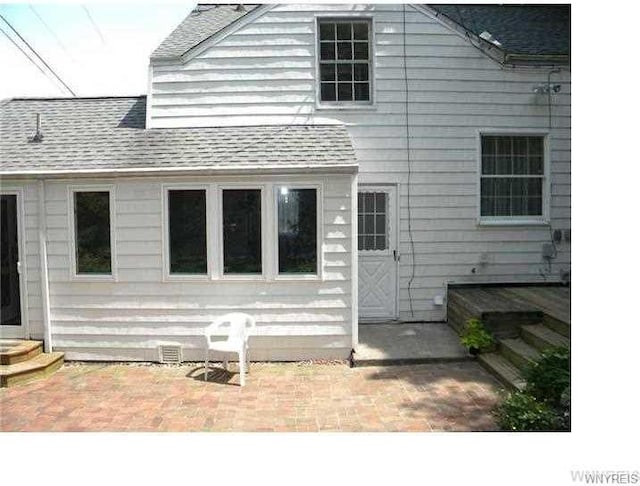 rear view of property with a patio