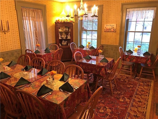 dining space with a chandelier