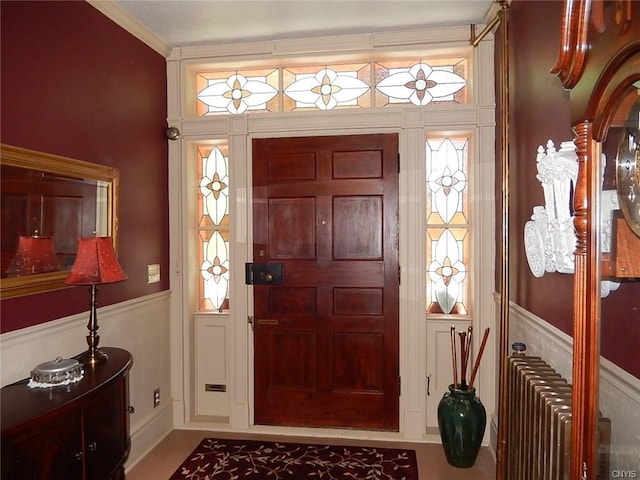 foyer featuring radiator heating unit