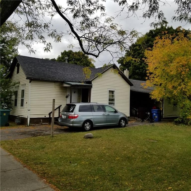 exterior space featuring a front lawn