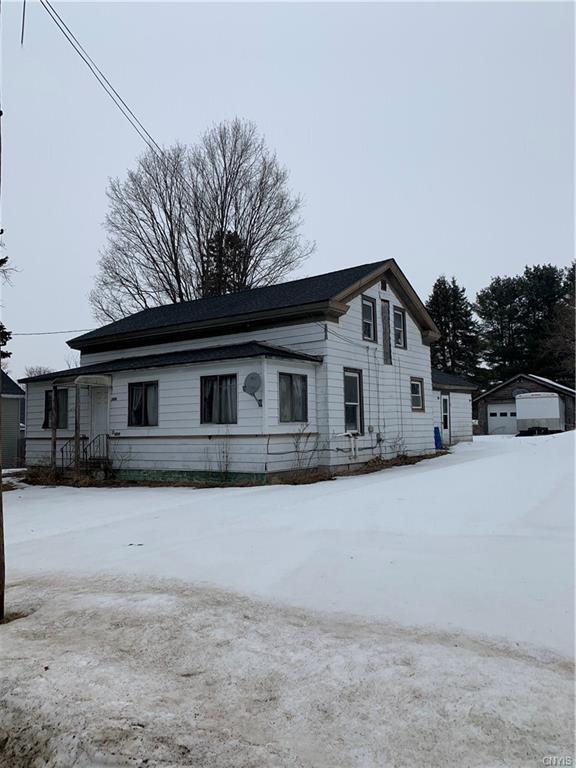 view of snow covered house