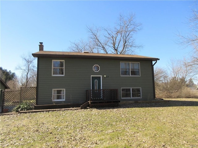 bi-level home with a front yard