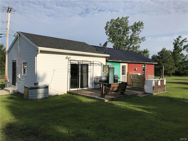 back of property featuring a yard and a patio