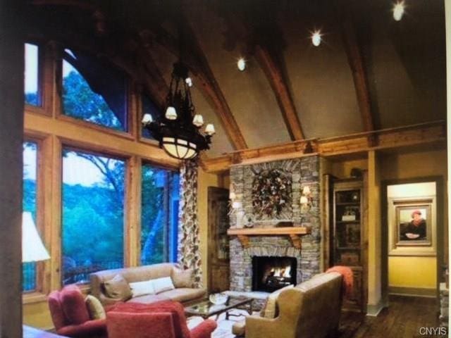 living room with beam ceiling, a fireplace, high vaulted ceiling, and dark wood-type flooring