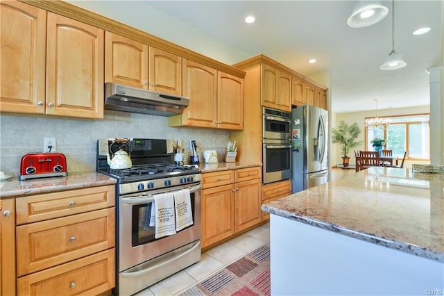 kitchen with a chandelier, backsplash, stainless steel appliances, light stone countertops, and decorative light fixtures