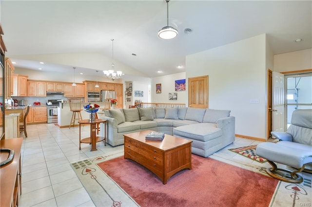 living room featuring light tile floors, a notable chandelier, and lofted ceiling