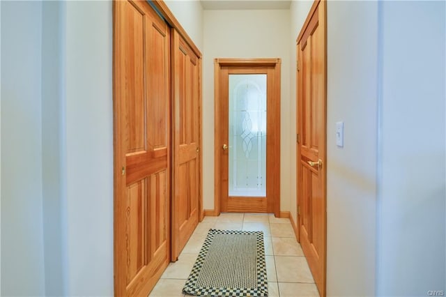 entryway featuring light tile floors