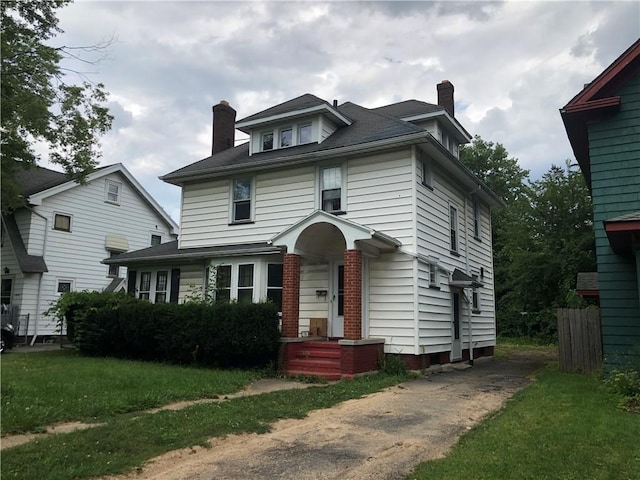 view of front property with a front lawn