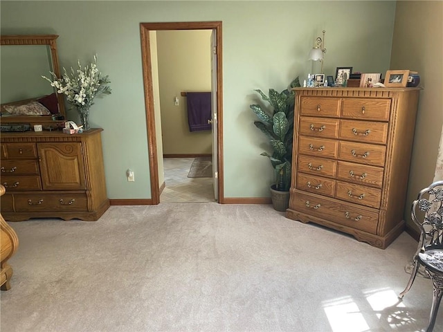 bedroom with light carpet