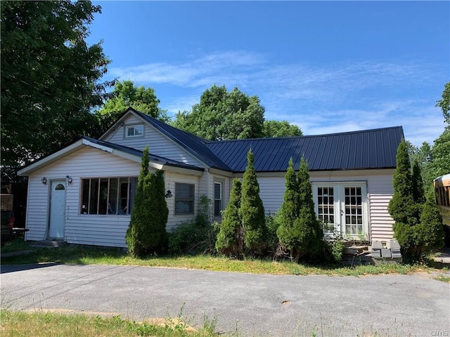 single story home featuring french doors