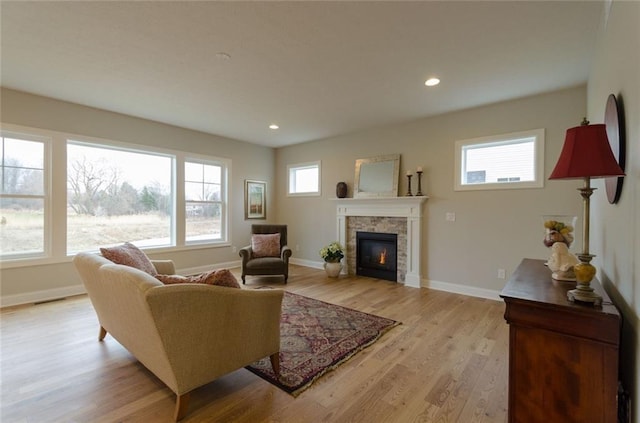 living room featuring light hardwood / wood-style floors and plenty of natural light