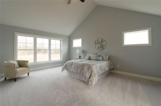 bedroom with high vaulted ceiling, light colored carpet, and ceiling fan