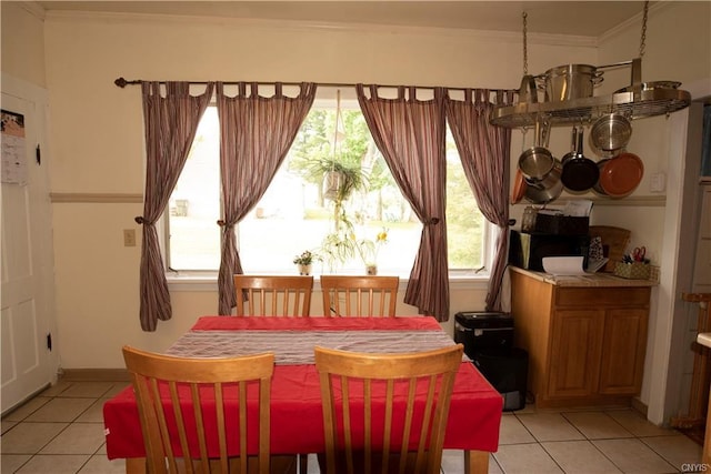 tiled dining room with crown molding